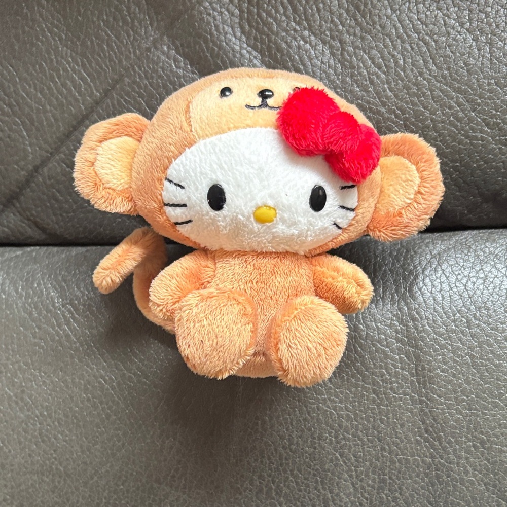 Hello kitty stuffed monkey